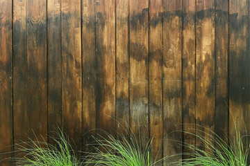 Brown wood plank wall texture background. Surface of teak wood background fence in garden. Wooden...