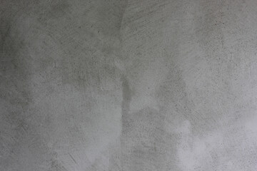 Empty gray concrete plaster wall. Cement texture background with copy space. Empty wall in modern...