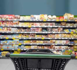 Abstract blurred supermarket.  choosing a dairy products at supermarket.