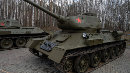 A large green tank with a red star on the front