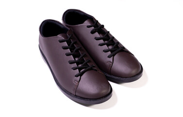 Brown leather man's shoes isolated on white background. After edits.