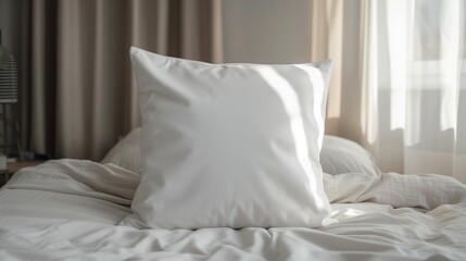 A pile of white pillows on a hotel bed