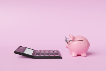 Pink piggy bank wearing spectacles in front of a black calculator on pink background. Illustration of the concept of commercial accounting, income calculation and retirement planning