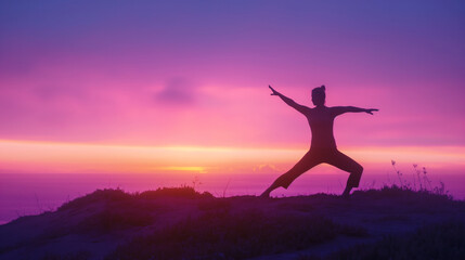 An inspiring silhouette of a person performing the warrior pose (Virabhadrasana) on a hilltop, with the first light of dawn illuminating the horizon behind them. Dynamic and dramat