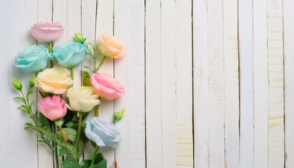 Colourful striped wooden wall decorated with flowers. Background with copyspace in bright pale pastel colours. 