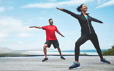 Couple, stretching and arms for fitness in nature with warm up, blue sky and morning activity for...