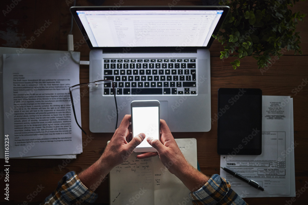 Leinwandbilder Person, programming and laptop with phone in office with typing for mockup space, coding and software script. Top view, technology expert and employee hands with programmer, it developer and notes