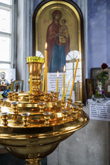 Candles and icons in the church