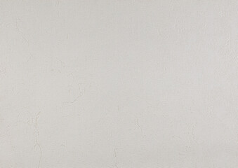 Light gray texture of paper wallpaper or plaster with barely noticeable stripes. The background is...
