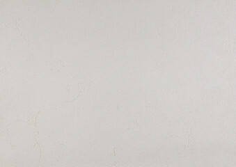 Light gray texture of paper wallpaper or plaster with barely noticeable stripes. The background is light abstract grunge.