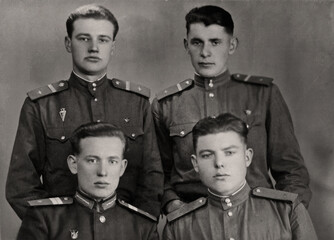 USSR, Kharkov - CIRCA 1955: Vintage photo of a group of Soviet Army soldiers.