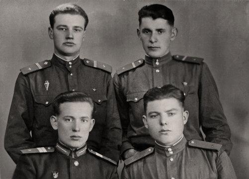 USSR, Kharkov - CIRCA 1955: Vintage photo of a group of Soviet Army soldiers.