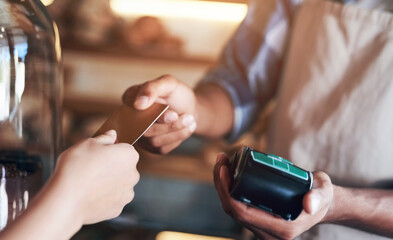 Hands, pos and credit card to buy at cafe, ecommerce and transaction on electronic machine. Coffee...