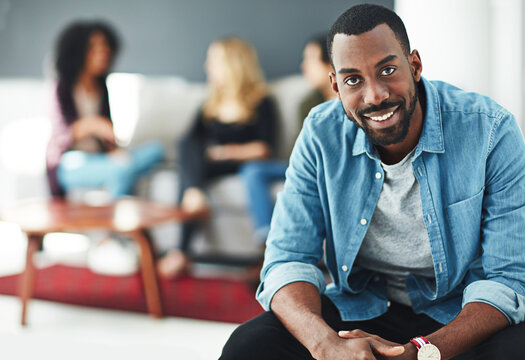Meeting, business people and portrait of black man in work lounge for new job, opportunity or career goals. Startup, training and happy African management intern in coworking space with confidence