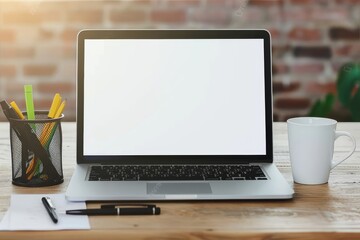 Fototapeta premium Serene workspace captures early morning productivity with laptop mockup on wooden desk