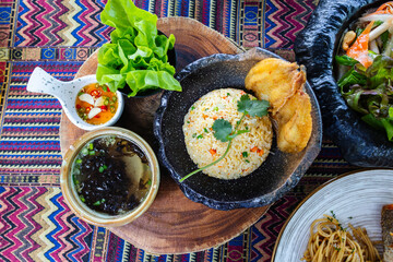 Fried rice with fried gourami fish