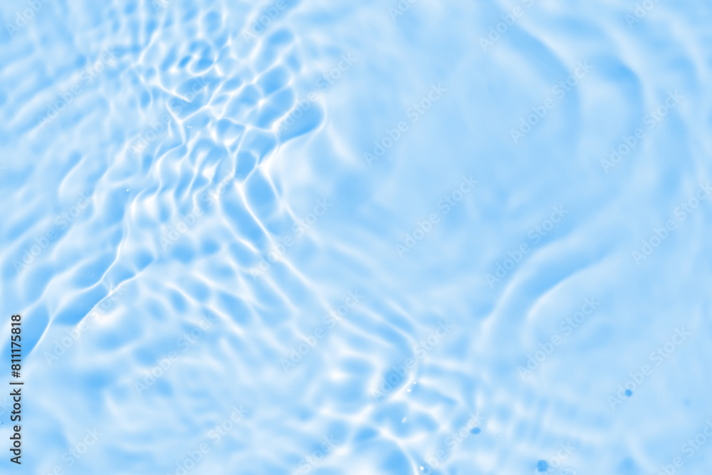 Wall mural abstract transparent water shadow surface texture natural ripple on blue background