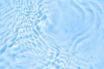 Abstract transparent water shadow surface texture natural ripple on blue background