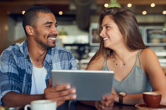 Happy, tablet and couple at cafe for food choice, menu or planning brunch meal for coffee shop date together. Digital, payment and app for online order at restaurant with customer experience survey