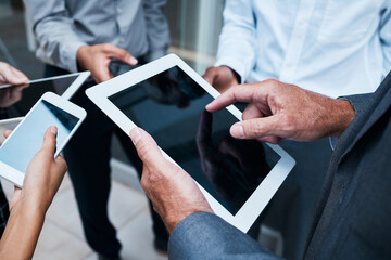 Business people, hand or tablet in group with screen for job, working with technology for meeting. Team, ebook or phone with internet for collaboration on sales mockup, together for teamwork