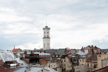 Town Hall tower in Lviv, Ukraine, top view from the rooftop, roofs of Old Town