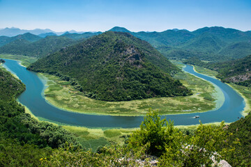 Pavlova Strana View Point. Beautiful summer landscape of green mountains, blue sky and Crnojevica...