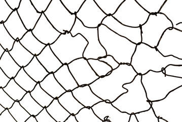 The texture of the metal mesh on a white background. Torn steel, metal mesh with holes