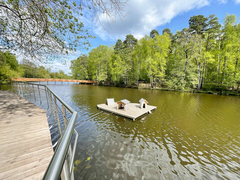  Moscow region, the city of Balashikha. The Pekhorka River in May in the area of the Pekhorka Forest Park, houses for ducks