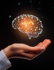 Cerebro iluminado con red neuronal flotando sobre una mano humana. 2024