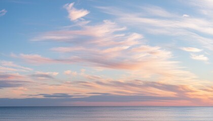 Fototapeta premium Ocean Symphony: Sunset Serenade with Pink Cirrus Clouds