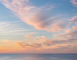Pastel Twilight: Serenity at Sea with Pink-Tinted Cirrus Clouds