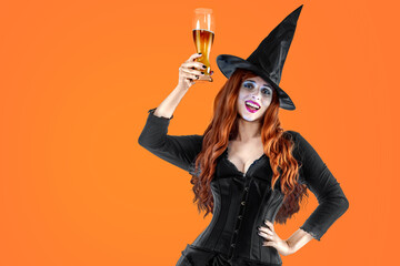 Halloween Witch drinking beer at a beer party. Female wizard fairy character. All Saints' Day....