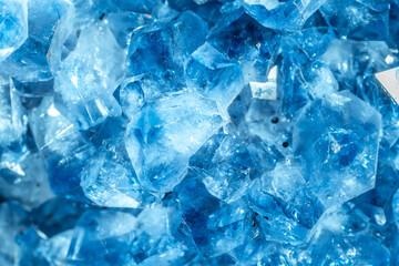 Blue Crystal Mineral Stone. Gems. Mineral crystals in the natural environment. Texture of precious and semiprecious stones. Seamless background with copy space colored shiny surface of precious stones