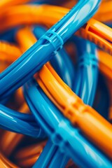 Abstract background in blue and orange colors of network patchcords. Technology and communications.