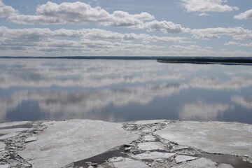ice floes near the river bank during the spring ice drift