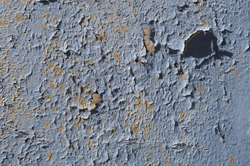 Texture of old paint with cracks on metal