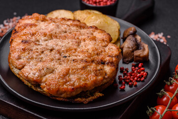 Delicious juicy turkey or chicken steak with salt, spices and herbs