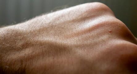 Human hand. Male skin pattern. Dermatology background. Health skin.