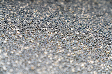 Cat litter granules close up. The texture of granular toilet filler. Cat litter in granules box. active carbon. texture pattern. Clean Cat litter in a litter tray. Background of white bentonite fresh 