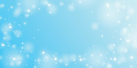 キラキラとした水色の背景。水色のパーティクル