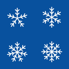 Set of White Snowflakes Isolated on Blue Background