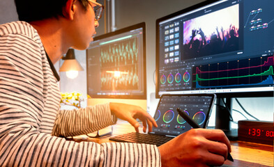 Filmmaker or movie video editor and colorist, working with footage or video on his personal...