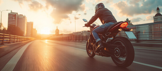 Crossing the bridge on a motorcycle at dawn