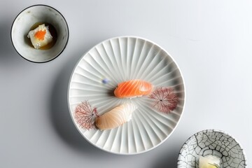 A white plate topped with sushi placed next to two bowls on a table, A minimalist design featuring delicate seafood dishes presented on elegant plates - Powered by Adobe