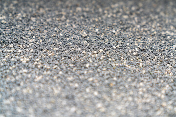 Cat litter granules close up. The texture of granular toilet filler. Cat litter in granules box. active carbon. texture pattern. Clean Cat litter in a litter tray. Background of white bentonite fresh 