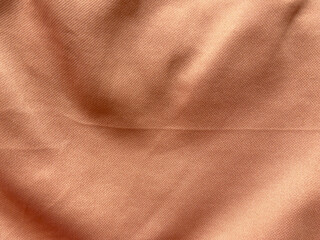 pink brown satin fabric with large folds