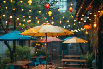 Outdoor patio setting with multiple tables topped with hanging umbrellas, twinkling string lights overhead, A outdoor patio with twinkling string lights and colorful umbrellas - Powered by Adobe