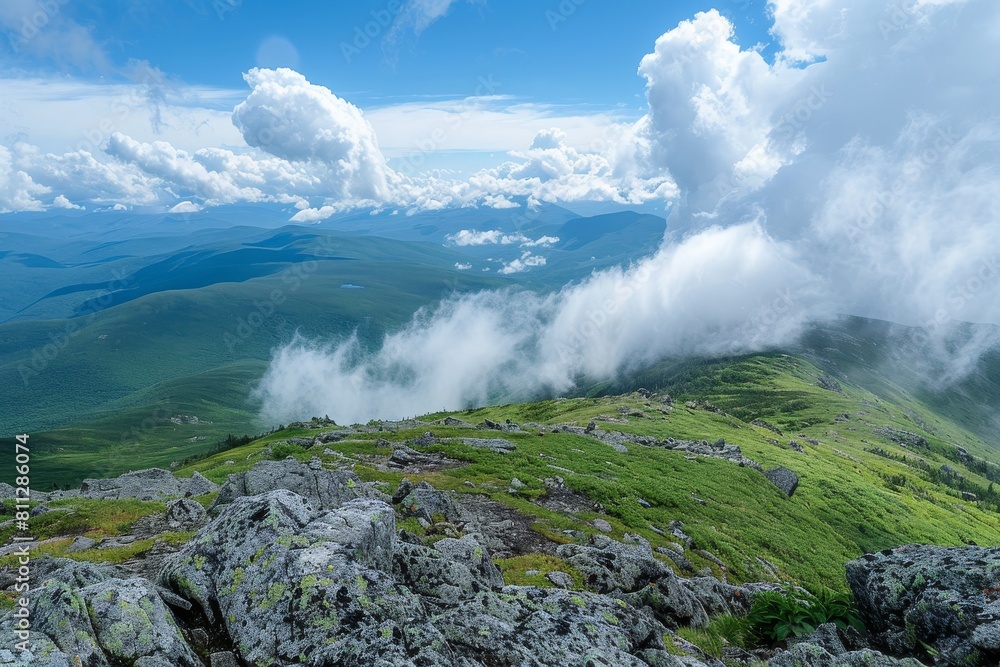 Poster a striking panoramic view from the summit of a mountain, showcasing billowing clouds in the sky, a p