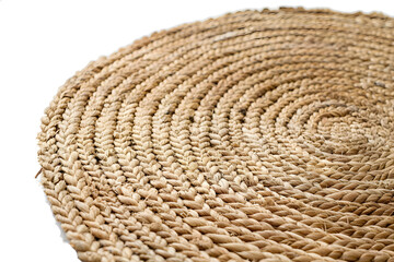 Obraz premium beige circular woven mat with detailed craftsmanship