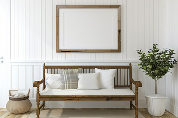Wooden bench against white wall with poster frame. Ethnic farmhouse interior design of modern entrance hall.